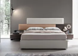 Letto con testiera sfalsata in ecopelle con comodino e luce integrati Bumpy di Maronese Acf