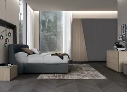 Letto in tessuto imbottito con testiera Golf Snug di Colombini Casa