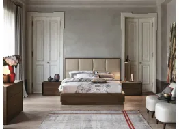 Letto Prestige con testiera imbottita rivestita in ecopelle di Tomasella