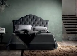 Letto in tessuto lavorazione capitonnè con testiera sagomata Queen di Bside