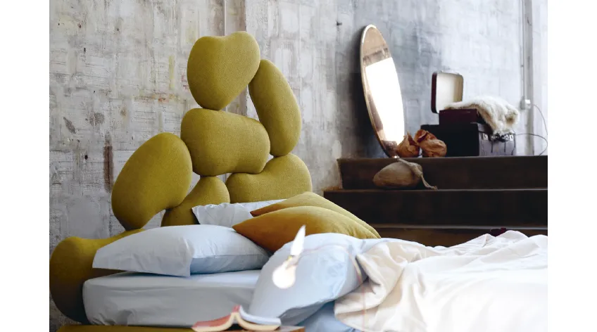 Letto con testiera scultura di design Stones di Noctis