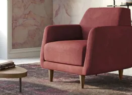 Poltroncina in tessuto con piedi in legno Adele di Doimo Salotti