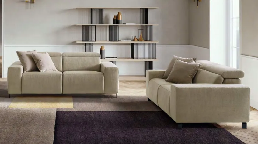 Divano lineare con movimento relax in tessuto Sebastian di Le Comfort