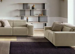 Divano lineare con movimento relax in tessuto Sebastian di Le Comfort