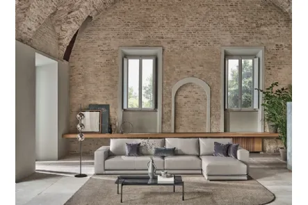 Divano in ecopelle con penisola Pitagora di Bontempi