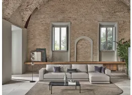 Divano in ecopelle con penisola Pitagora di Bontempi