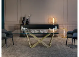 Tavolo Tenso con top in vetro e base composta da tubi in metallo intrecciati e verniciati di Tonin Casa