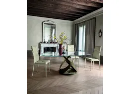 Tavolo rotondo con struttura in metallo e base in marmo con top in vetro di Tonin Casa